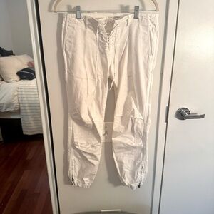 NIKI LOTAN lace up white tapered pants